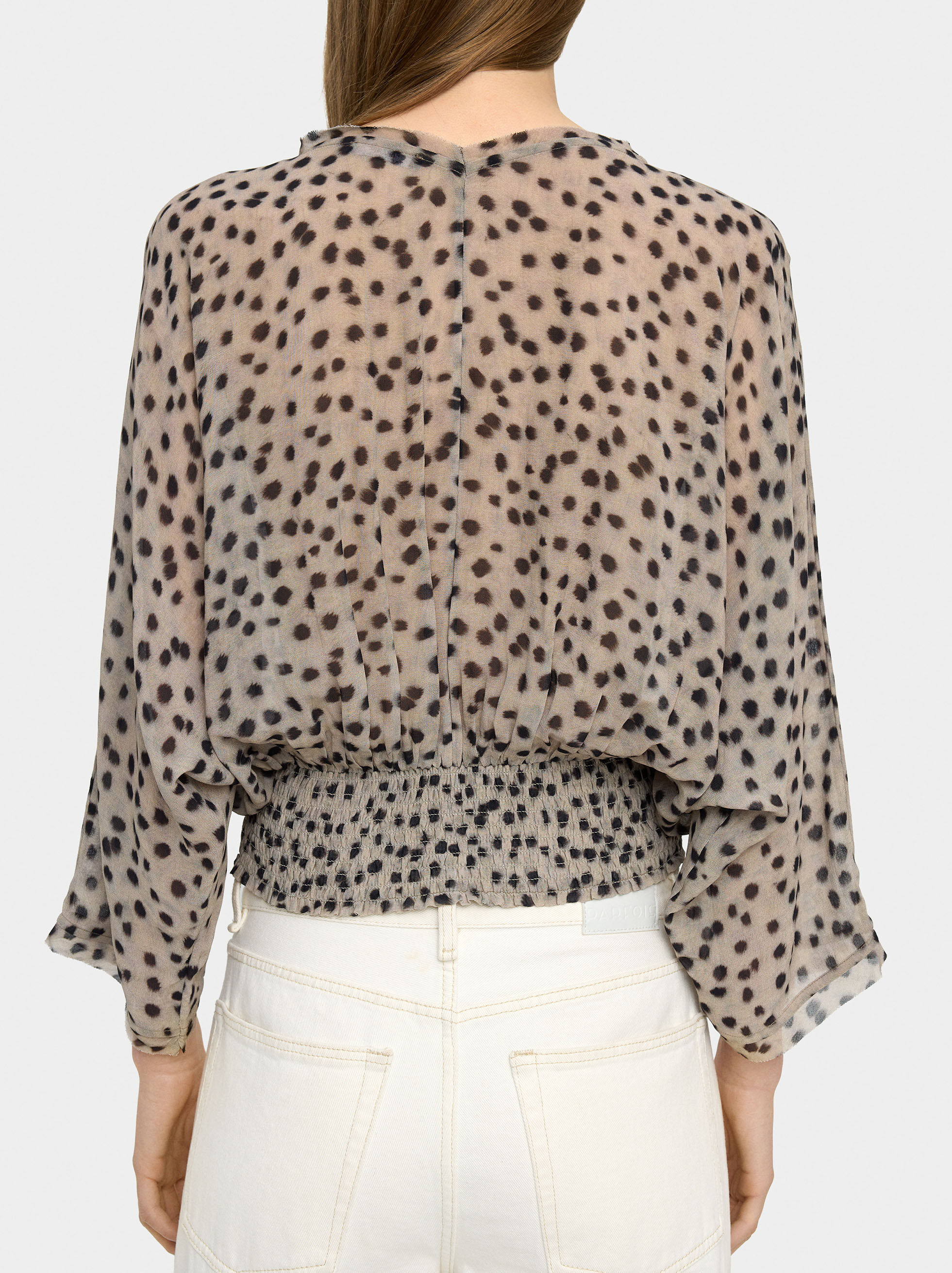 Blusa fluida con elastici