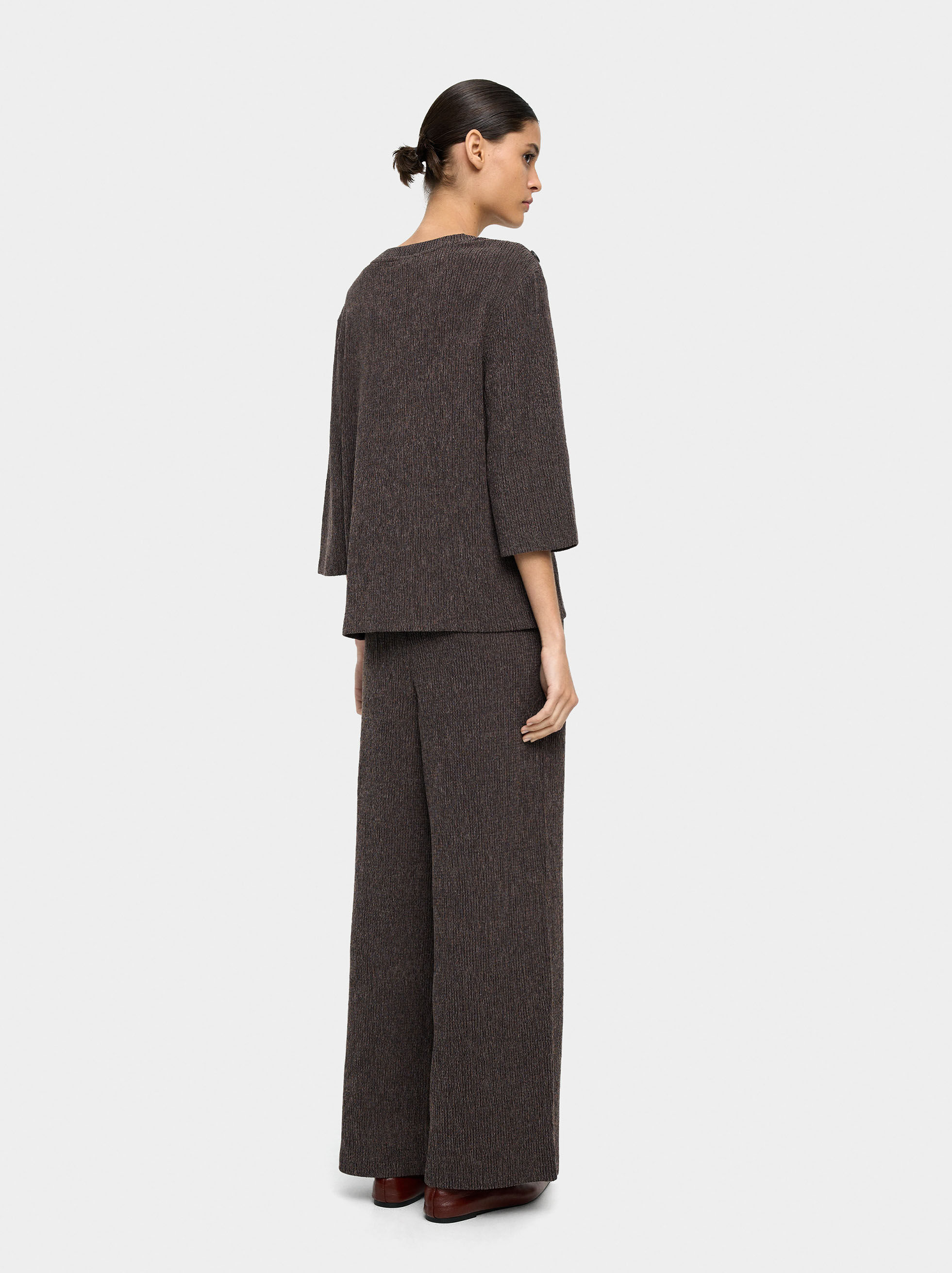 Maglia con texture e dettaglio bottoni sulle spalle
