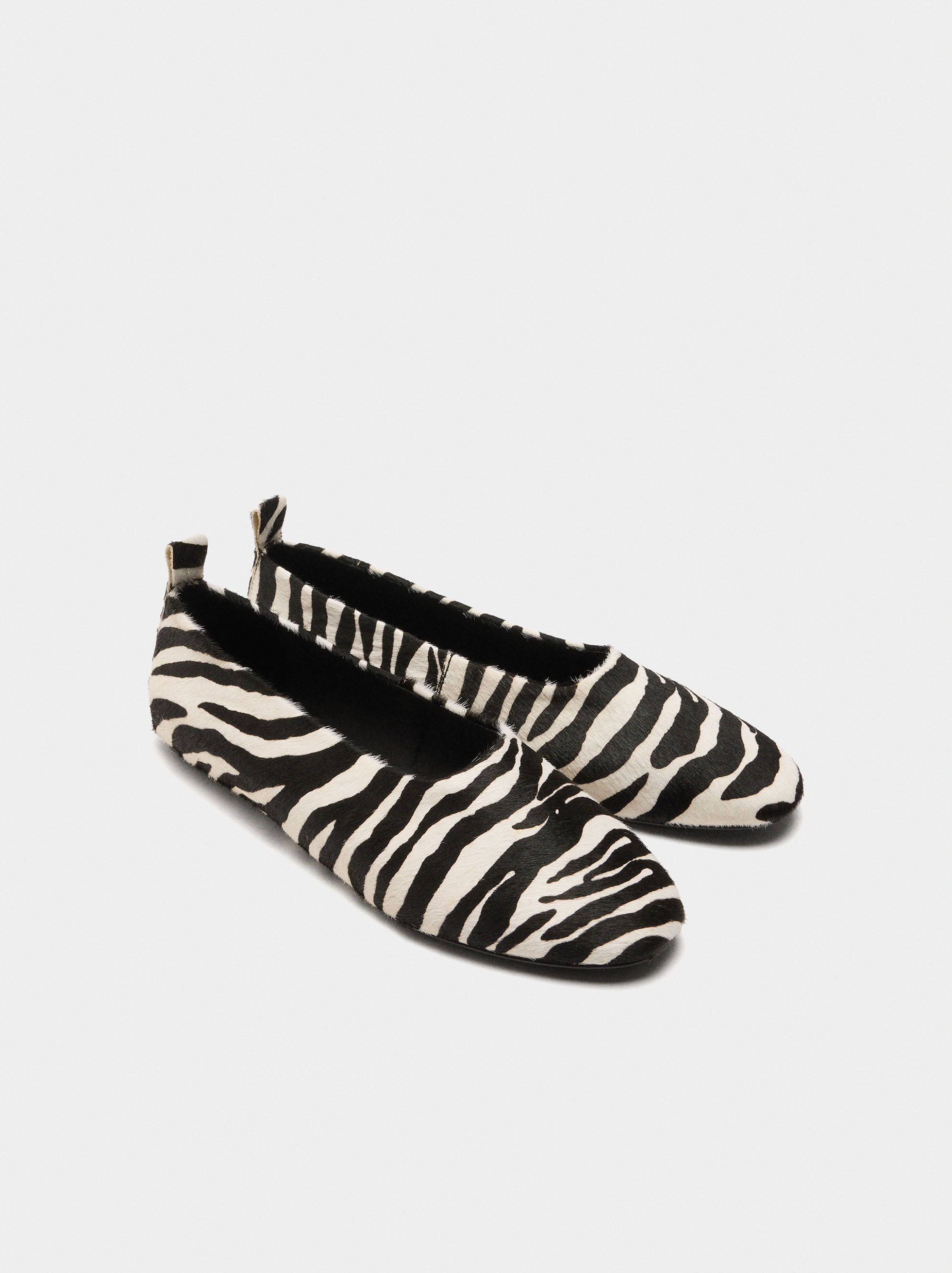 Sabrinas in pelle con stampa animale