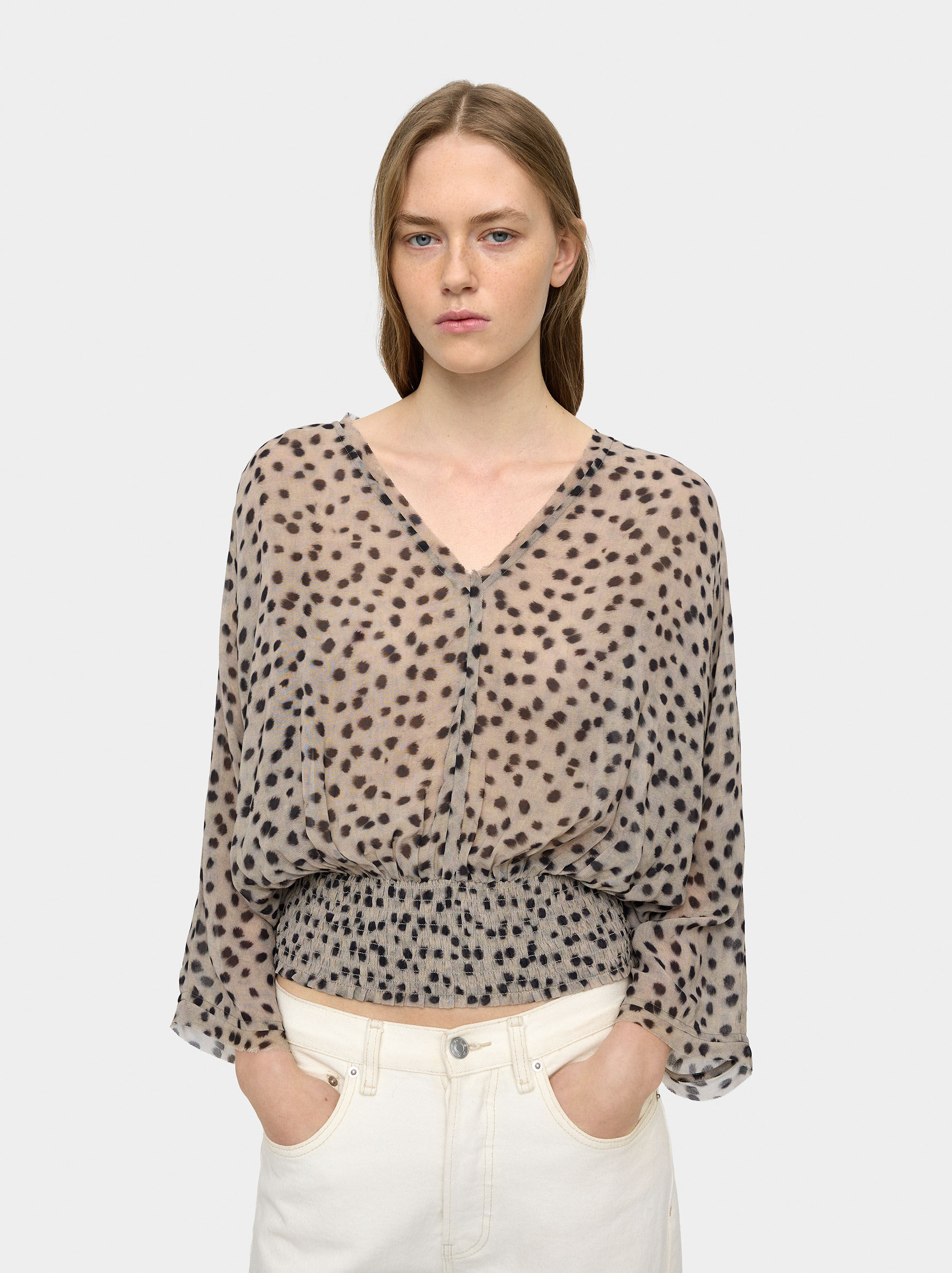 Blusa fluida con elastici